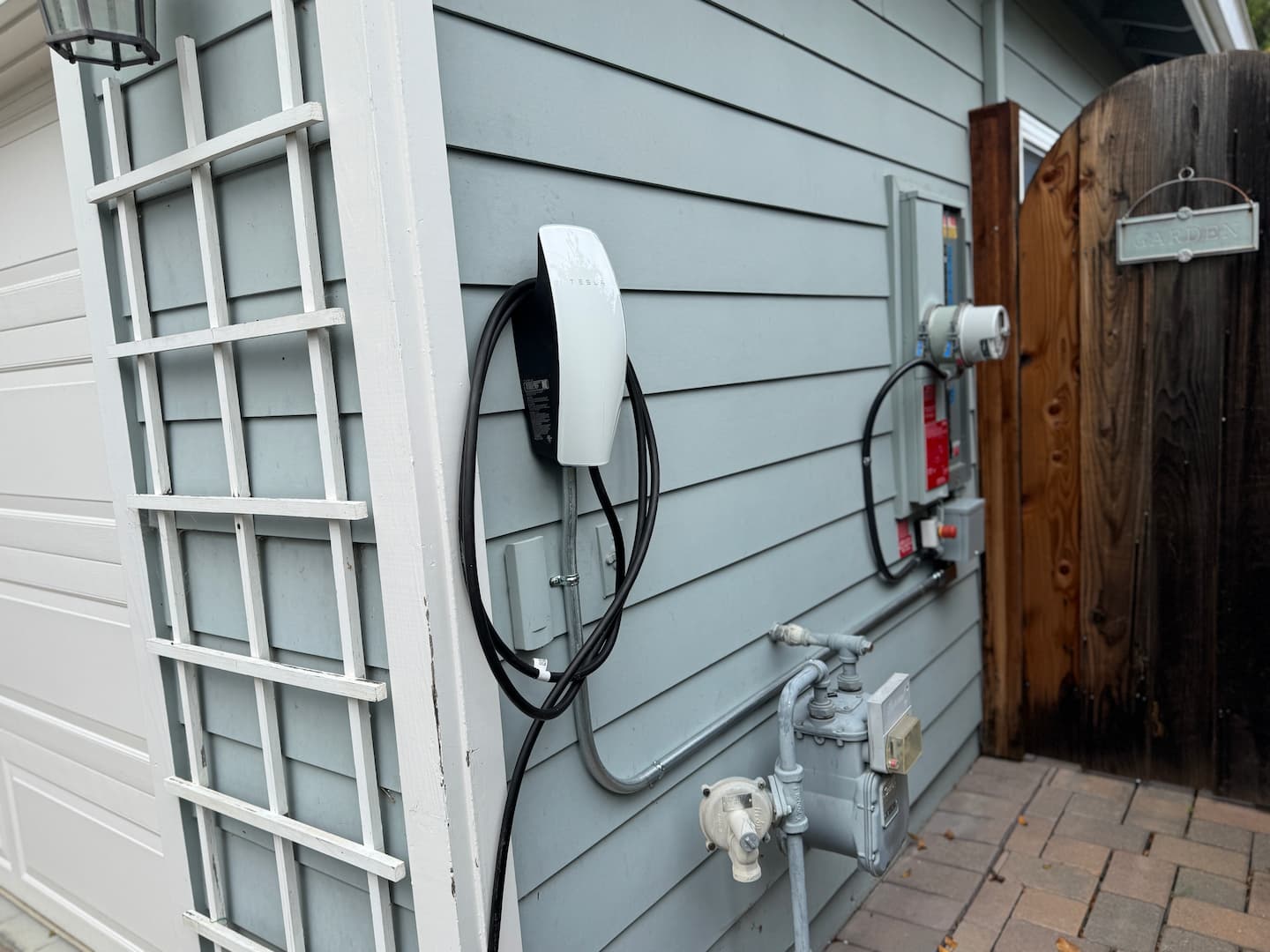 HAXX technician reviewing electrical readiness for EV charger installation