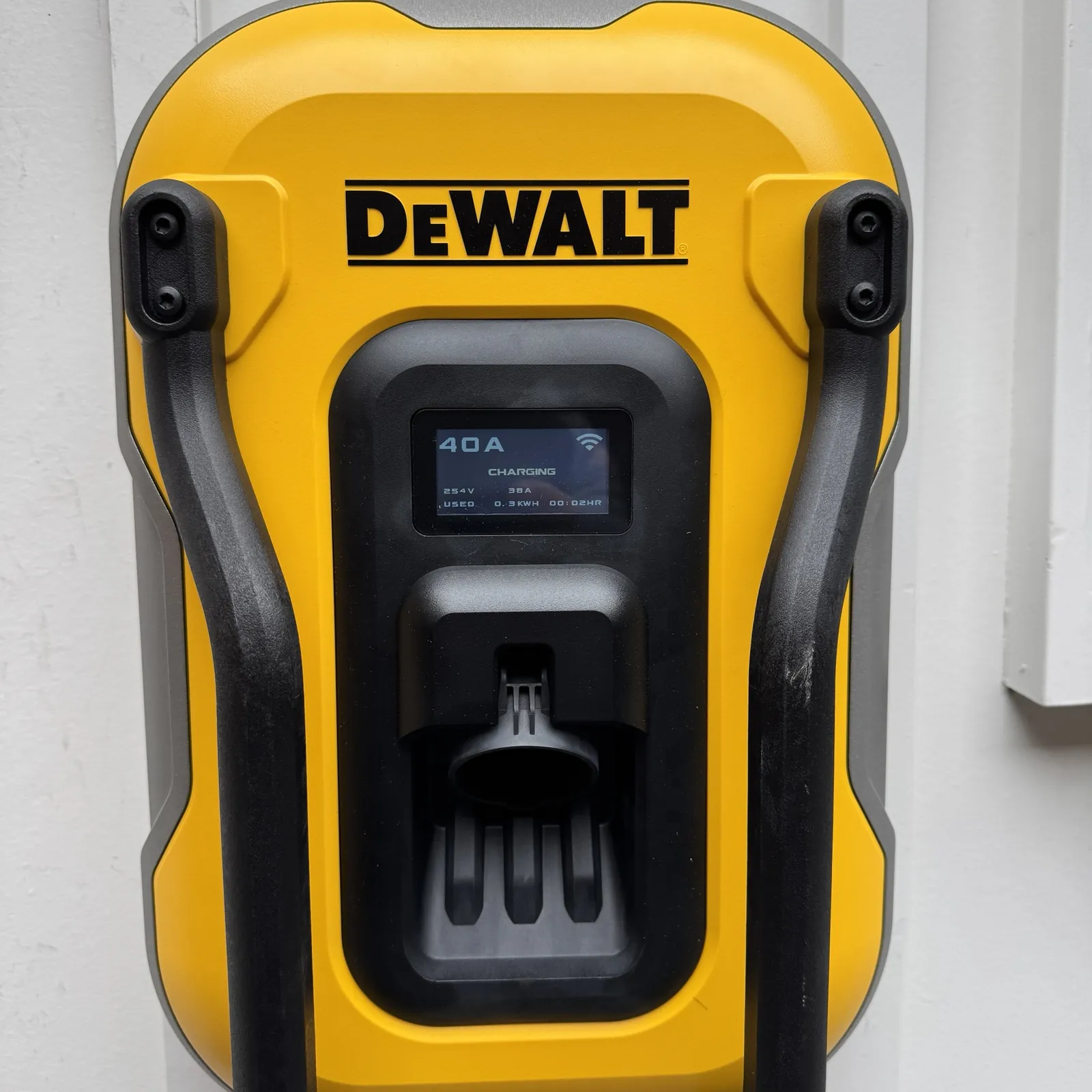 DeWalt EV charger display showing 40 amps while charging at a Los Altos home
