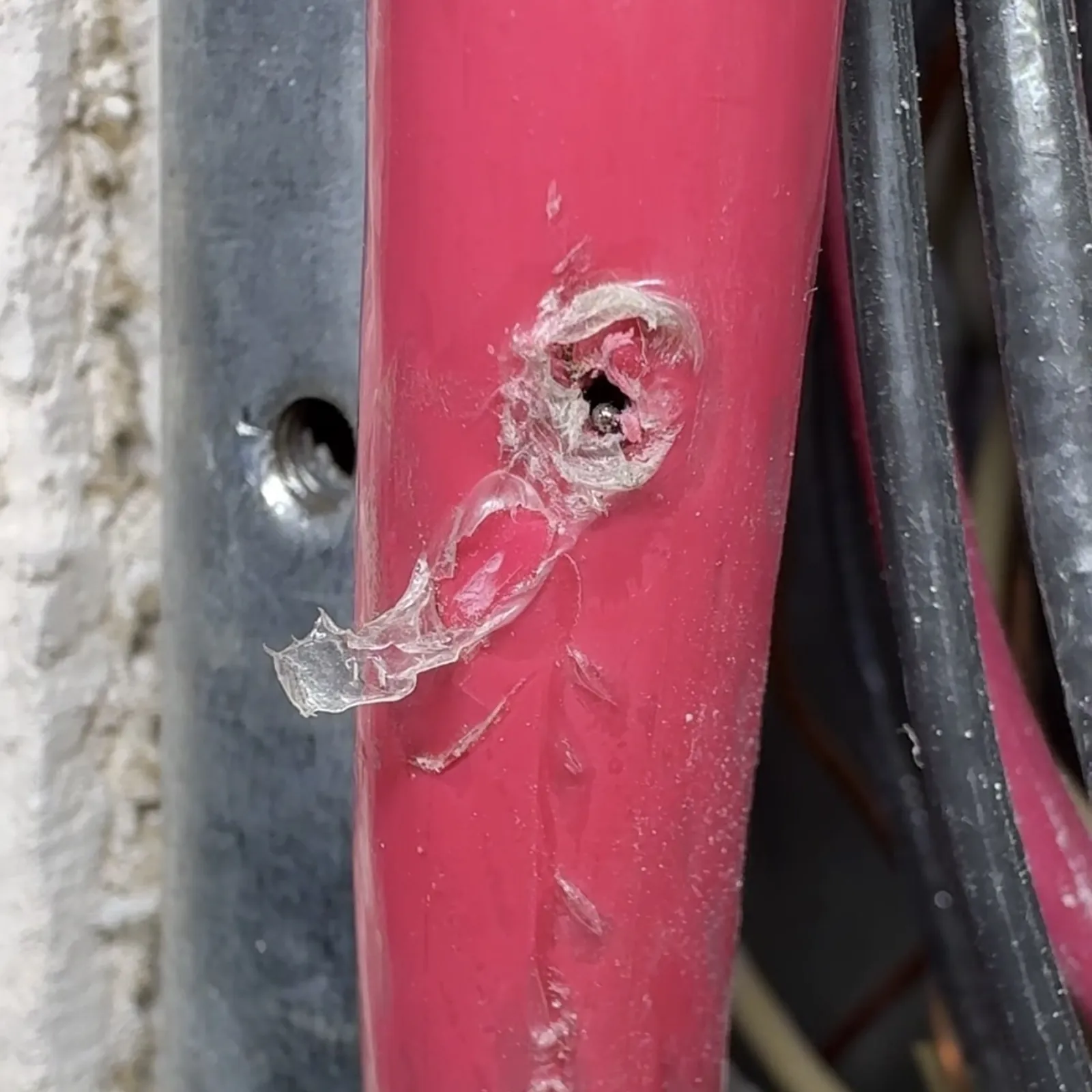 Hole in the insulation of a 200-amp service conductor inside an electrical panel in a San Jose home
