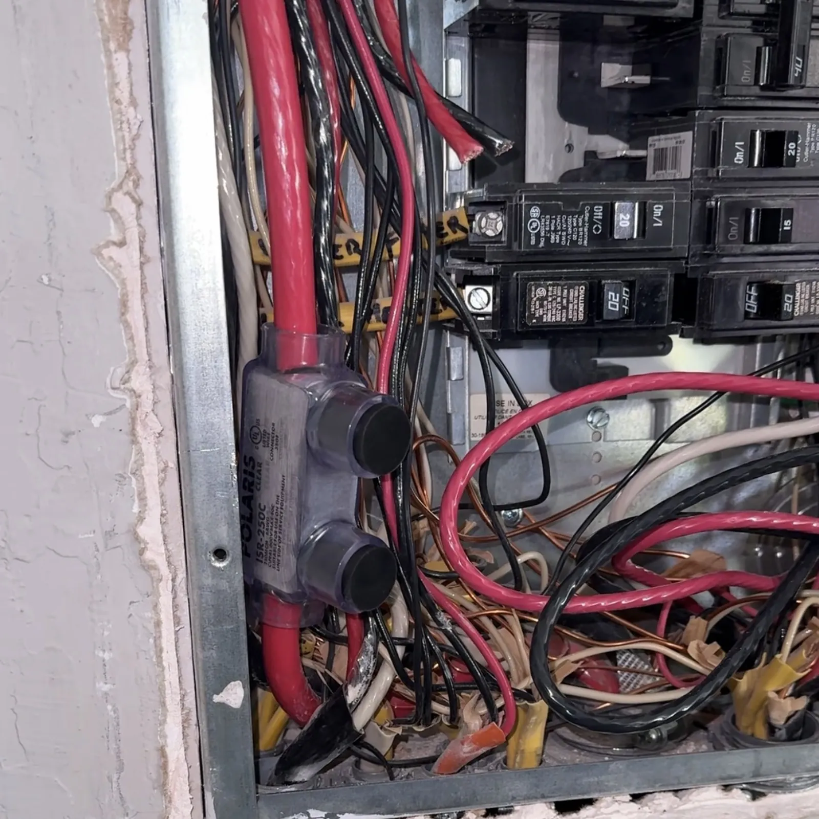 Service conductor repaired with a Polaris insulated connector inside an electrical panel in a San Jose home