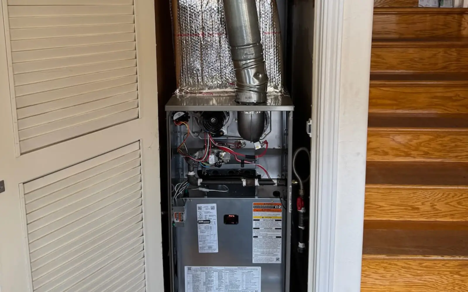 Gas furnace installed by HAXX in a hallway closet